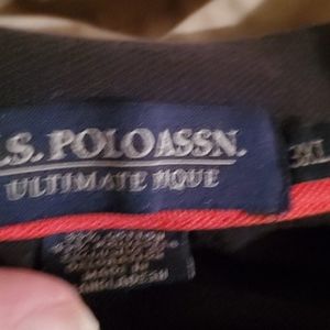 A black polo shirt never worn once mint condition